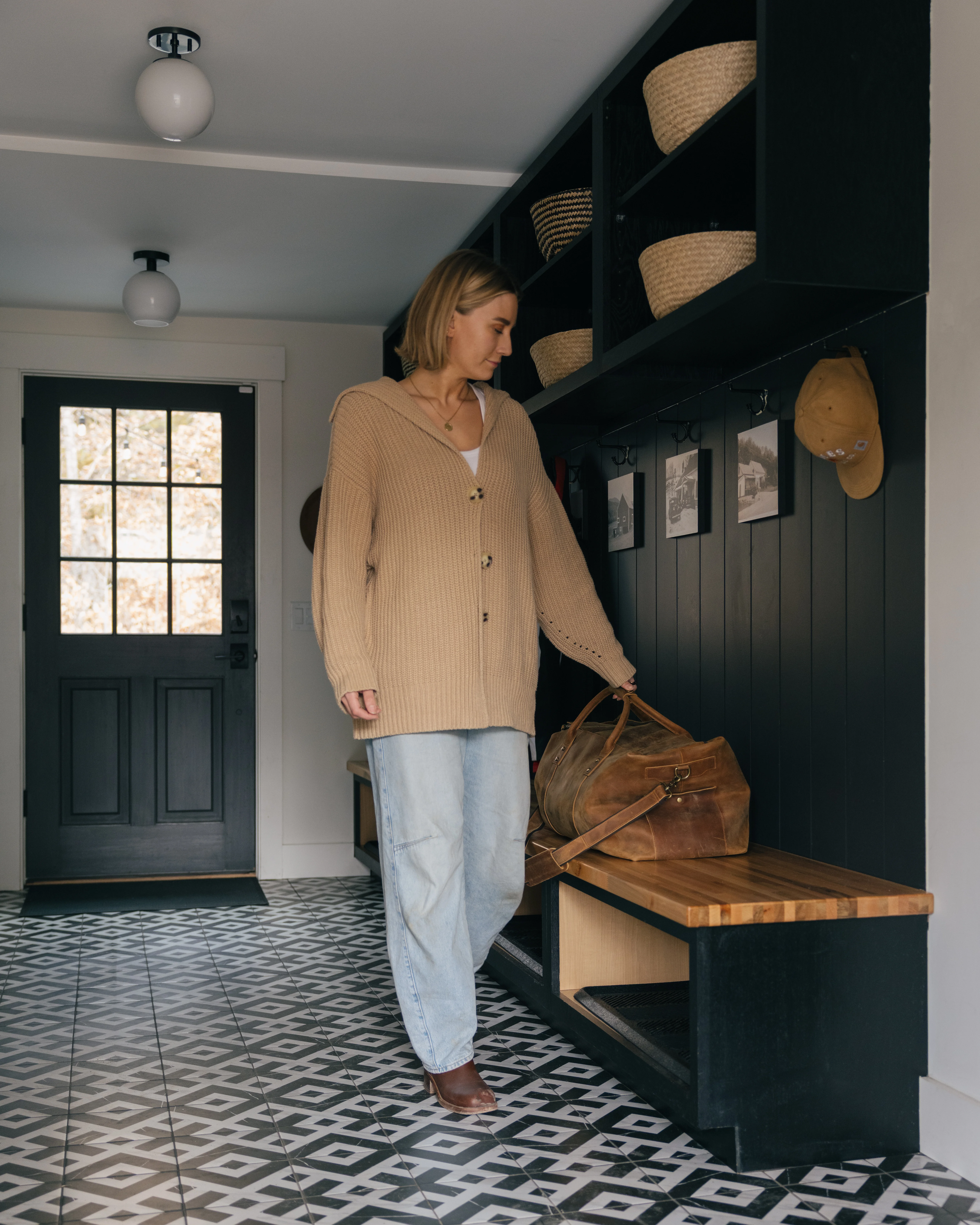 Entry hallway at Mile Away with welcoming decor and natural light